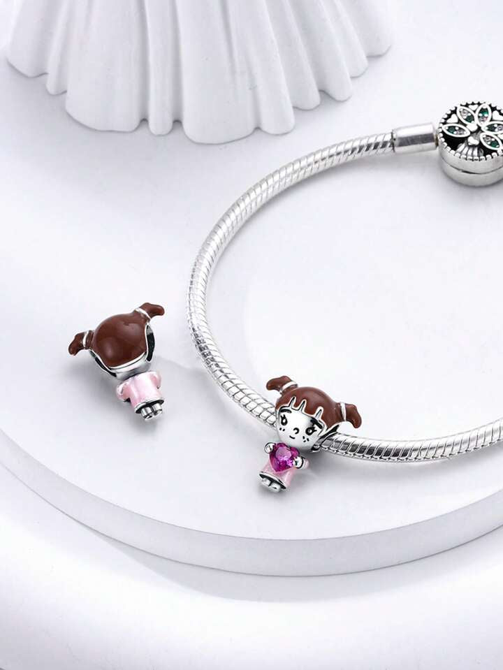 Charm Niña con Corazon de Gema