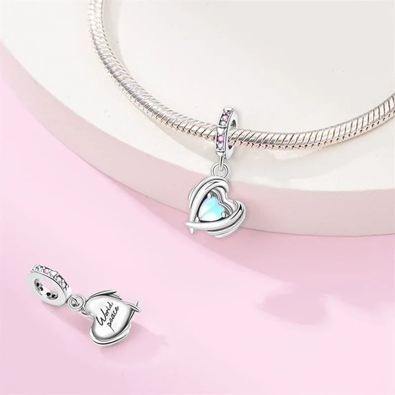 Charm Corazon Celeste y Plata