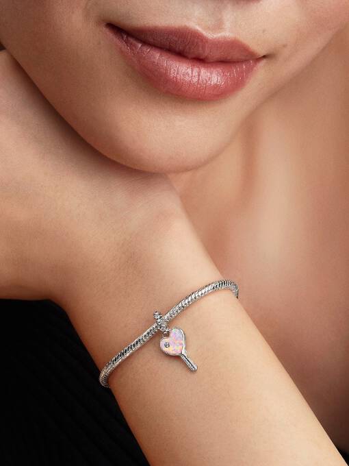 Charm colgante Llave de corazón opalescente