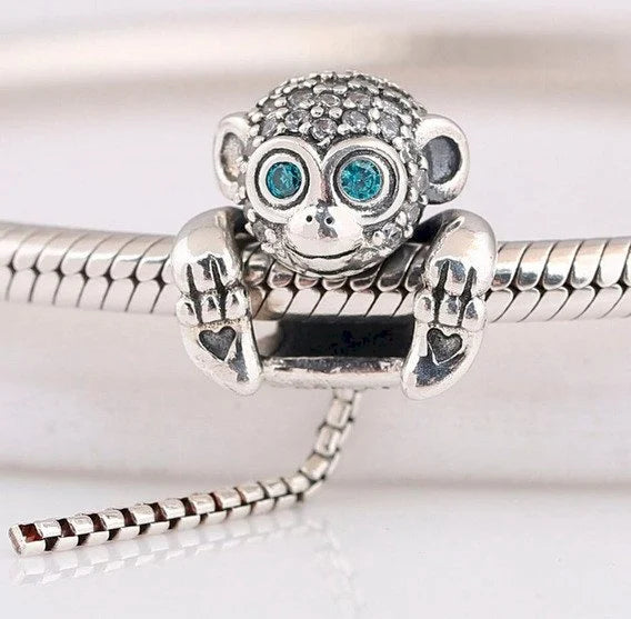 Charm Monito Brillante