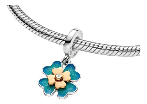 Charm Flor Azul y Dorado