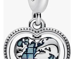 D_NQ_NP_777969-MLM83709081772_042025-O-dije-omamori-charm-corazon-mundo-giratorio-viajes.webp