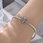 Charm Calavera con Corona Fluorecente