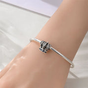 Charm Corona Con Detalles Azules