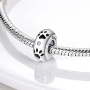 Charm Plata con Huellas