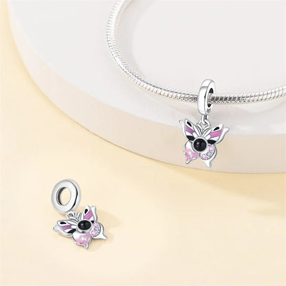 Charm Mariposa y Piedra Negra