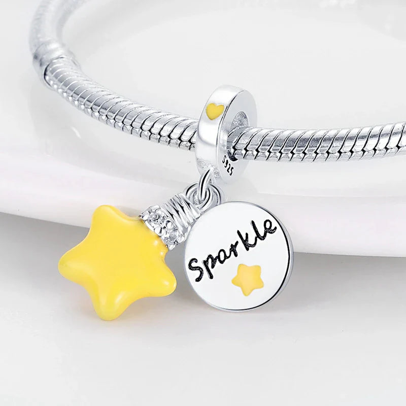 Charm Estrella Sparkle Fluorescente