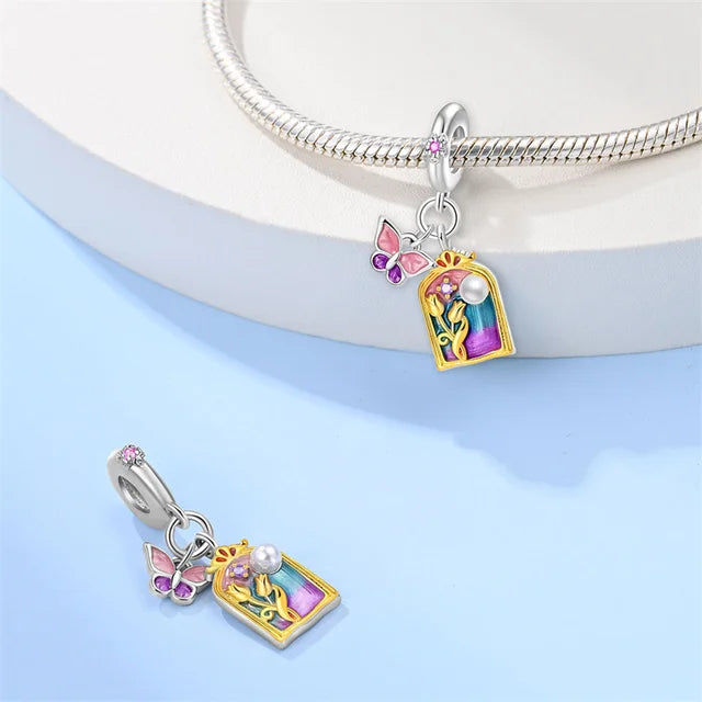 Charm Mariposa y Ventana Rosa