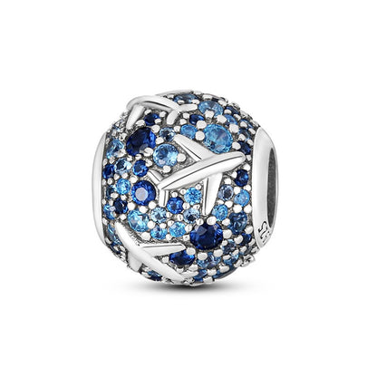 Charm Viajero Azul