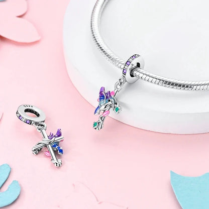 Charm Colibri y Cruz Floral