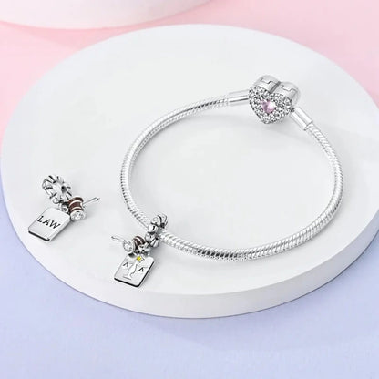 Charm Martillo y Libro de Justicia