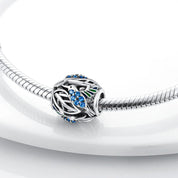 Charm Esfera con Colibri