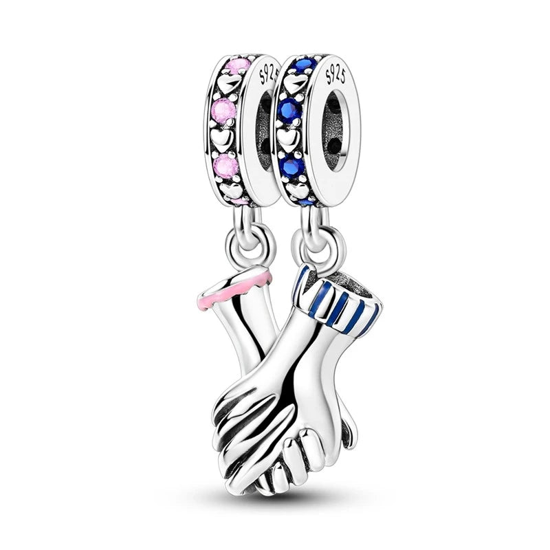 Charm "Manos Unidas"