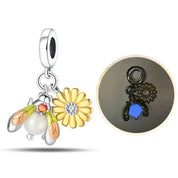 Charm Luciérnaga Fluorescente y Flor Amarilla