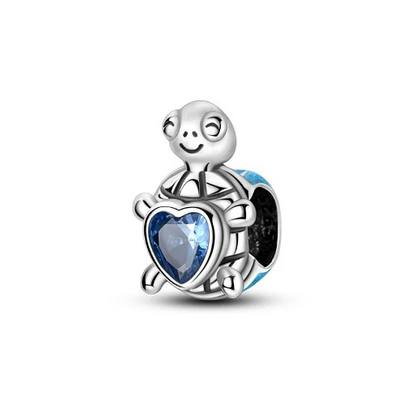 Charm Tortuga Azul y Corazon Azul